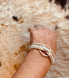 Interwoven Faux Leather Bracelets With Hollow Circular Pendant