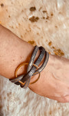 Interwoven Faux Leather Bracelets With Hollow Circular Pendant